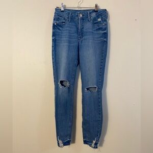 Distressed Blue Jeans